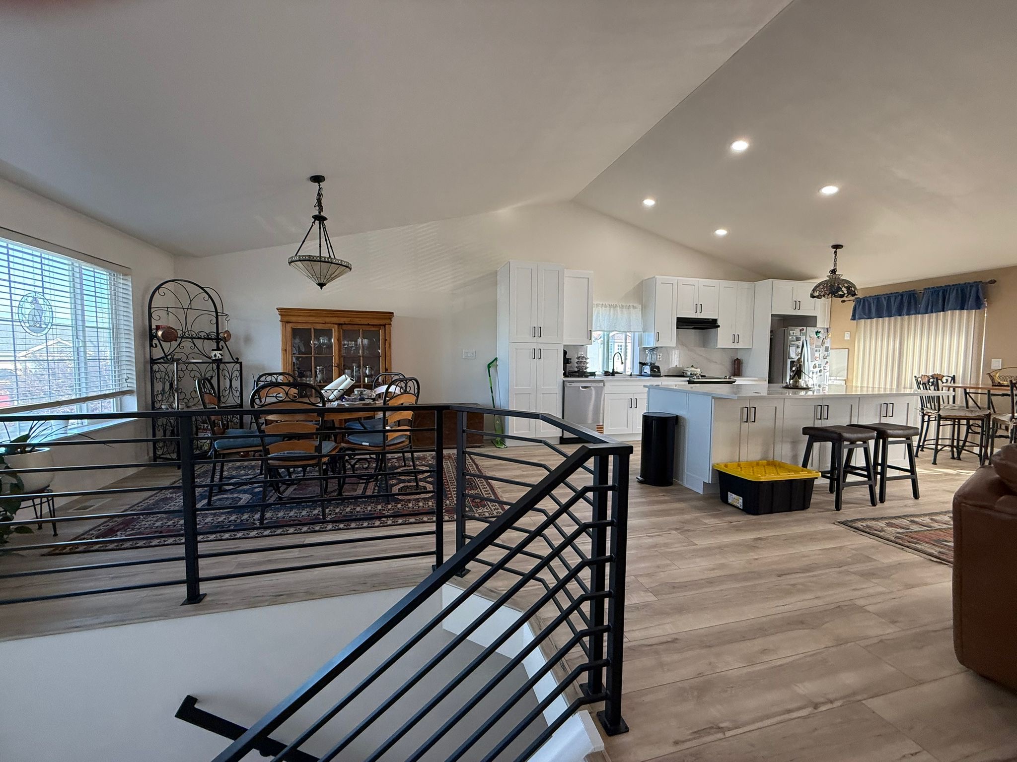 Modern lighting and architectural details in open space living room remodel in Seattle